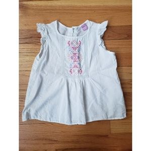 White embroidered flutter sleeve top
